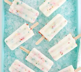 happy funfetti cake batter popsicles, Several cake mix pops on a bed of ice in a blue tray