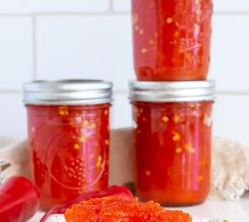 red pepper jelly, jars of red pepper jelly and red pepper jelly over cream cheese