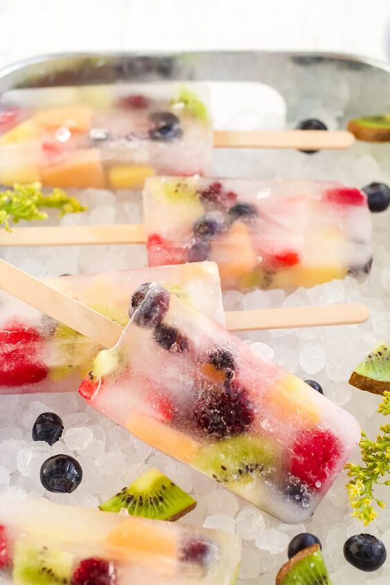 rainbow fruit popsicles, Rainbow fruit pops on a bed of ice with fruit