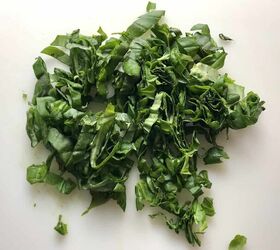 Sliced basil leaves for Tomato and Onion Salad