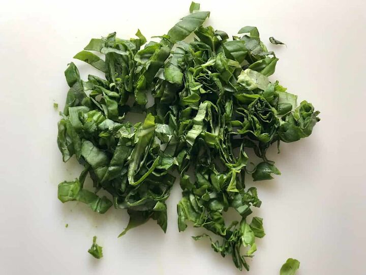 Sliced basil leaves for Tomato and Onion Salad
