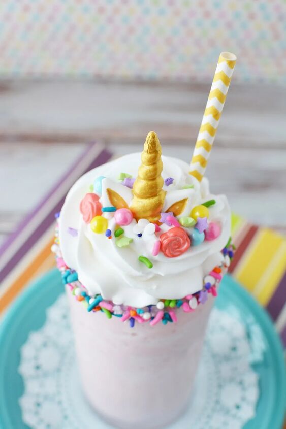 copycat raspberry cotton candy frappuccino recipe, Cotton candy frappuccino with unicorn horn candy and other toppings to look like a unicorn frappuccino