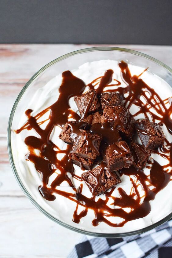 Top of a brownie trifle drizzled with hot fudge