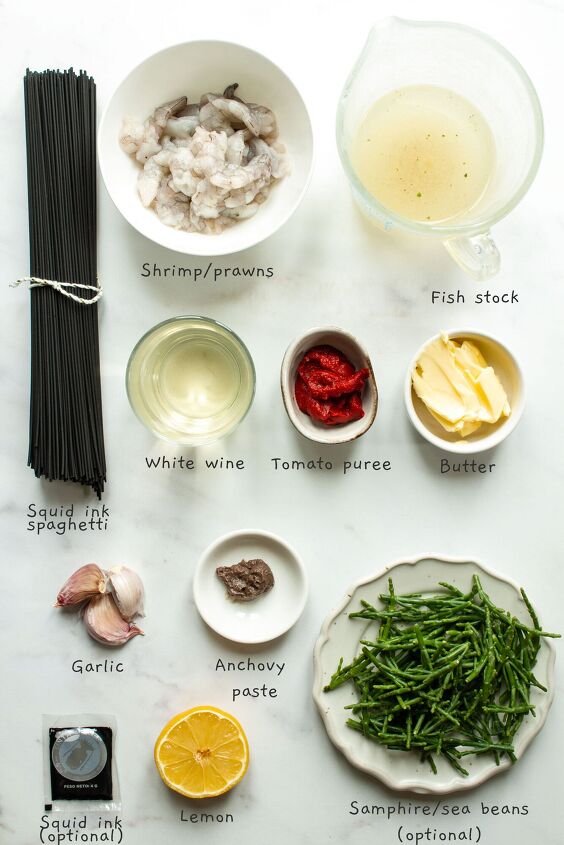 black squid ink pasta, Recipe ingredients laid out on a white background