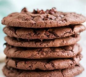 chewy brownie mix cookies recipe, Stack of brownie cookies with chocolate chips on a white table with a blue napkin