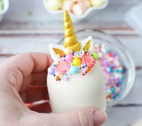 adorable unicorn hot chocolate bombs, Unicorn hot chocolate bomb with a gold horn and sprinkle mane