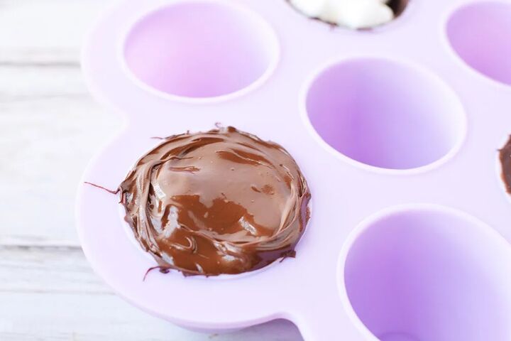 easy hot chocolate bombs, Covering hot chocolate bomb with more chocolate in candy mold