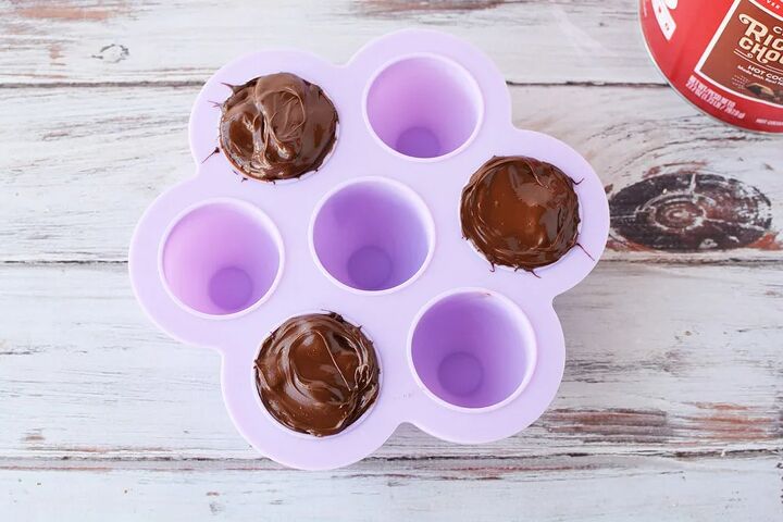 easy hot chocolate bombs, Three hot chocolate bombs in candy mold