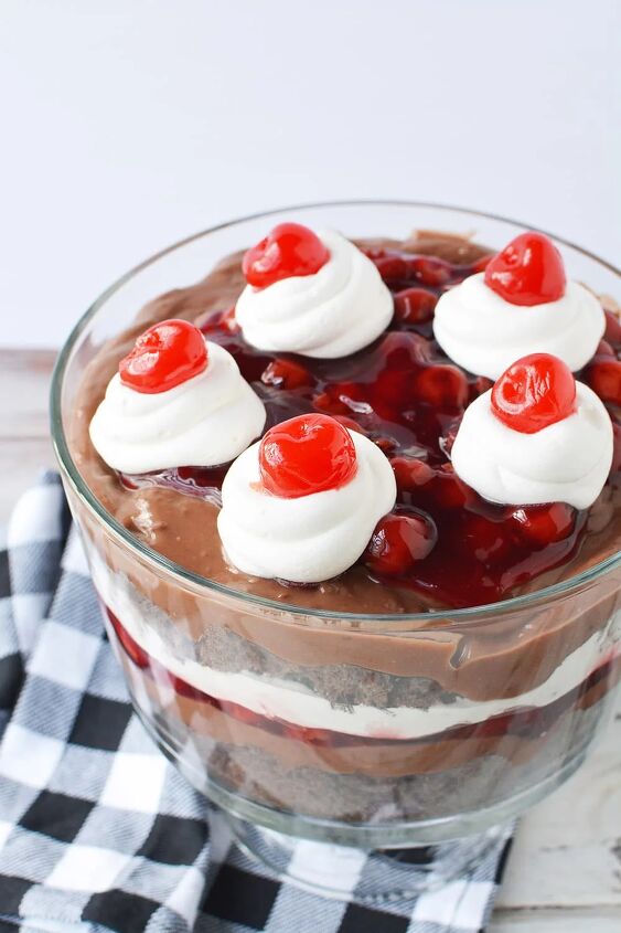 chocolate cherry black forest trifle, Chocolate cherry trifle in a bowl on a table with blue and white napkin