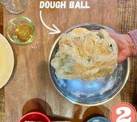 easy vegan flour tortillas using a press, a hand holding a vegan dough ball
