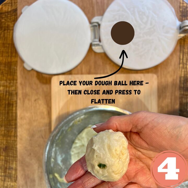 easy vegan flour tortillas using a press, A hand holding a dough ball next to a tortilla press