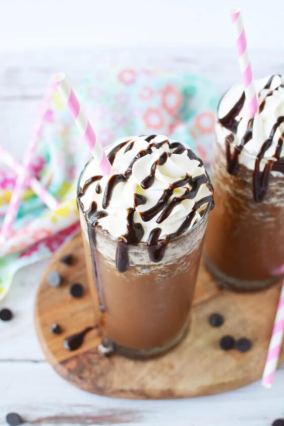 homemade java chip frappuccino recipe, Java chip frappuccino in a glass topped with whipped cream and syrup