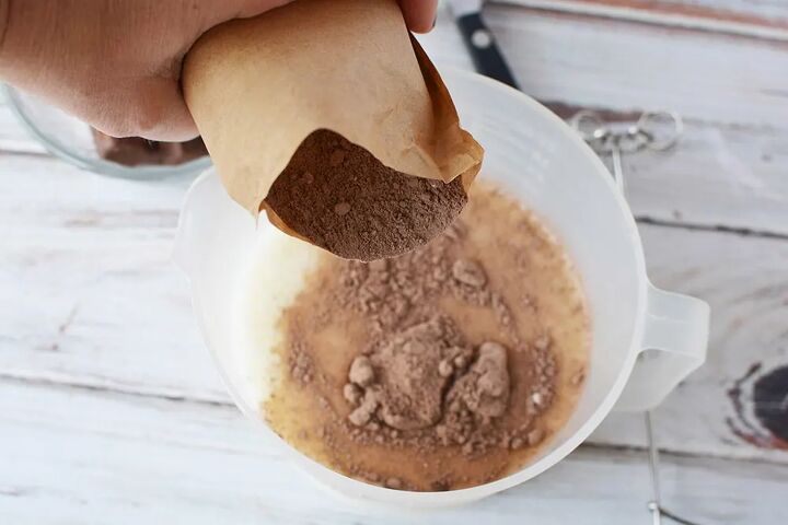 chocolaty chocolate trifle recipe, Pouring instant pudding into the milk in a bowl