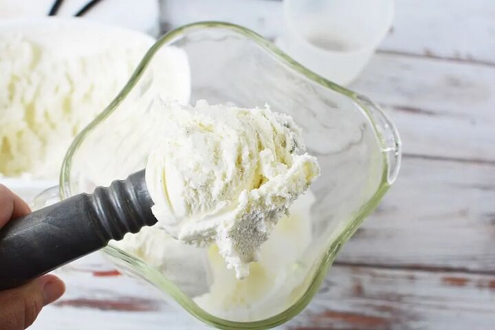 icy and refreshing vanilla bean frappuccino, Scooping vanilla bean ice cream into a blender