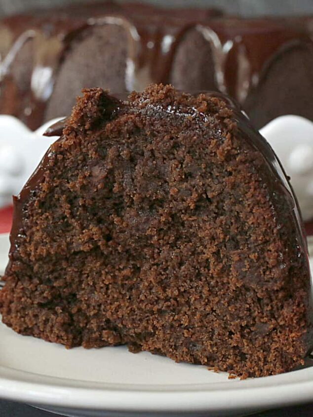 chocolate fudge cake, A slice of choclate cake on a white plate