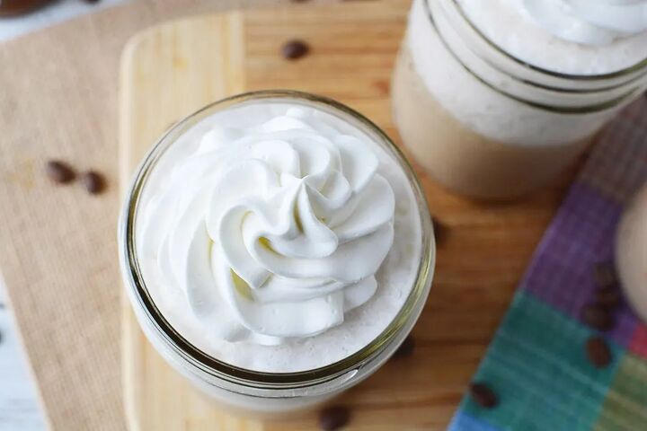 icy and creamy caramel frappuccino recipe, Whipped cream on top of frappuccino