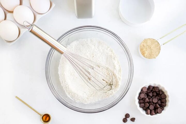 5 minute chocolate chip air fryer cookies, Flour mixture for cookies in a mixing bowl with a whisk