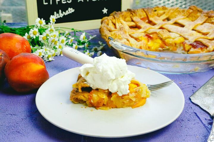 honey peach pie homemade, Slice of fresh peach honey pie with a dollop of fresh whip cream served on plate with a fork