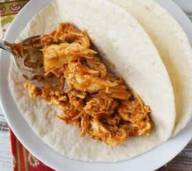 easy and flavorful chicken ranch tacos, Chicken taco mixture into a tortilla