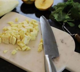 the best sweet potato hash fast easy one pot recipe, cutting board with diced apple knife apple cut in half
