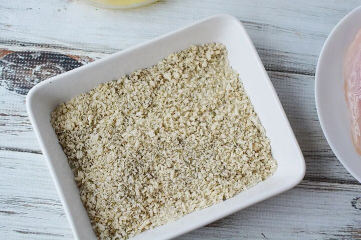 easy parmesan crusted chicken recipe, Bread crumbs and seasonings in a bowl