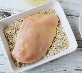 easy parmesan crusted chicken recipe, Dipping egg washed chicken into a bowl of bread crumbs