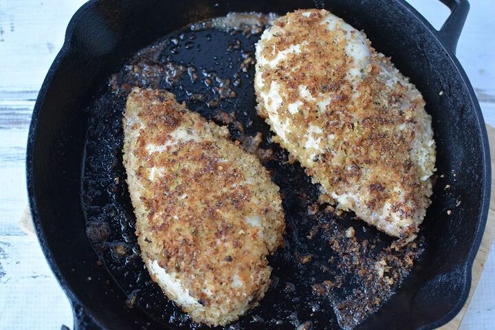 easy parmesan crusted chicken recipe, Browned chicken breasts in a skillet