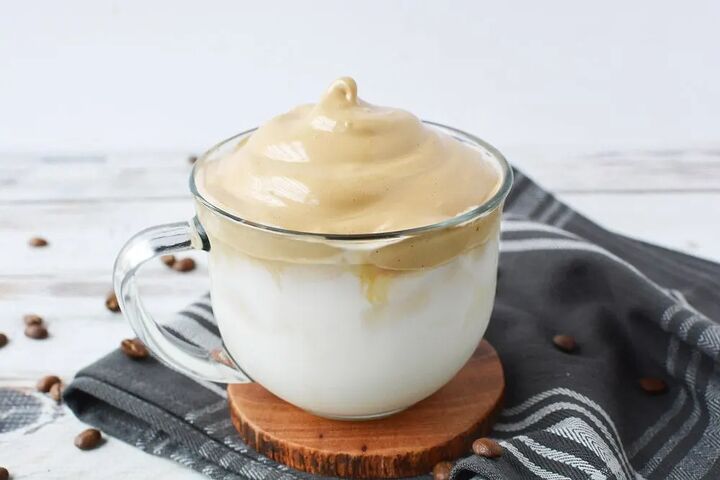 easy iced dalgona whipped coffee recipe, Whipped coffee in a clear mug