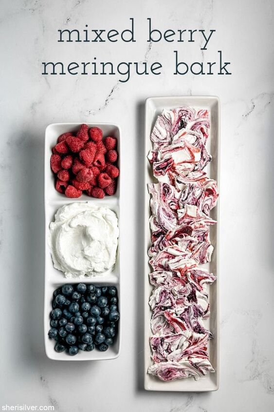 make this easy mixed berry meringue bark recipe for memorial day, berries and whipped cream in a divided ceramic tray next to a tray of berry meringue bark