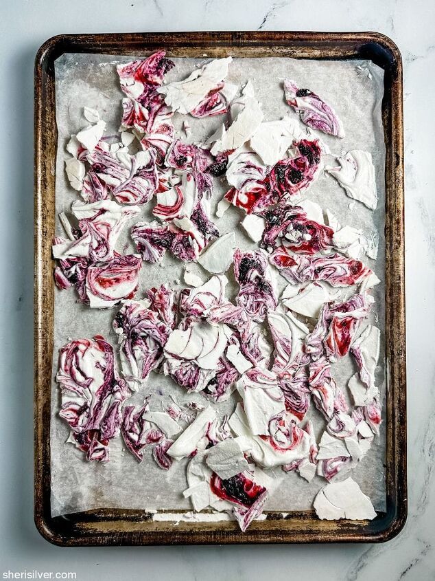 make this easy mixed berry meringue bark recipe for memorial day, mixed berry meringue bark on a baking sheet