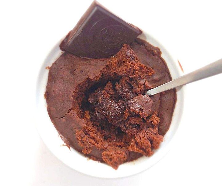 gooey chocolate mug cake that chocolate lovers need in their life, Gooey chocolate mug cake with a chocolate square