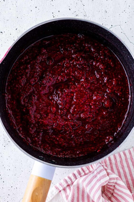 how to make raspberry compote, Bring the raspberry mixture to a boil and then simmer to thicken it