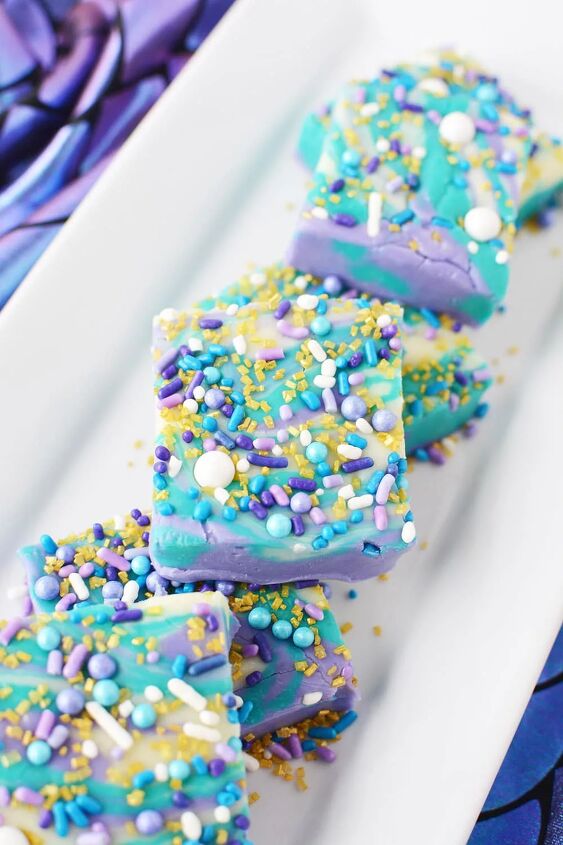purple and blue swirl mermaid candy fudge, Mermaid candy fudge cut into squares on a plate