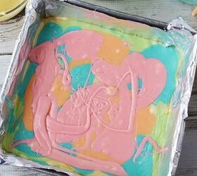 easy rainbow unicorn fudge recipe, Swirling melted chocolate in a pan to make fudge