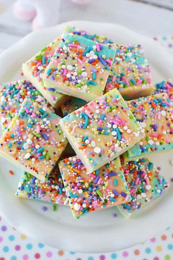 easy rainbow unicorn fudge recipe, Sliced rainbow fudge with sprinkles on a plate