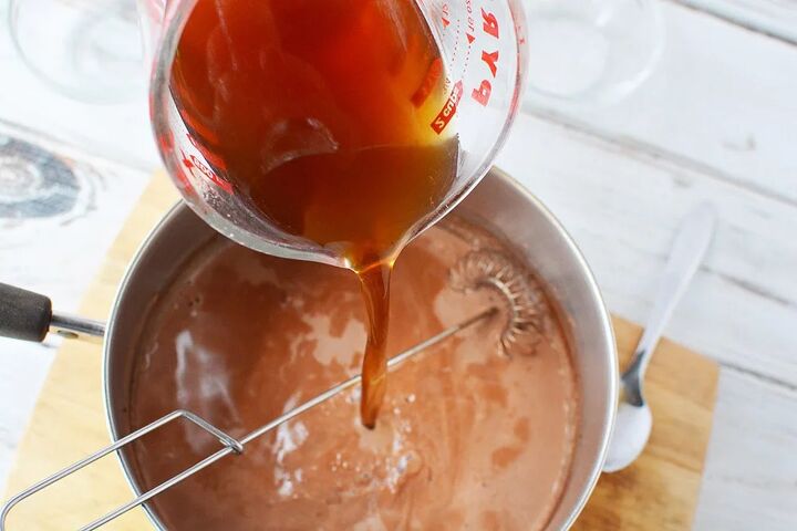 copycat salted caramel mocha drink recipe, Pouring coffee into hot milk