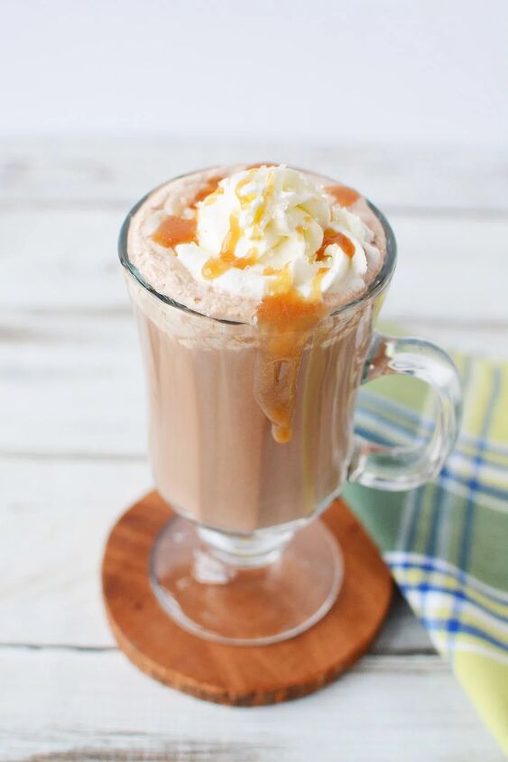 copycat salted caramel mocha drink recipe, Coffee drink topped with whipped cream and caramel in a glass mug