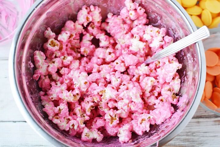 rainbow popcorn snack or party mix, Pink popcorn in a bowl