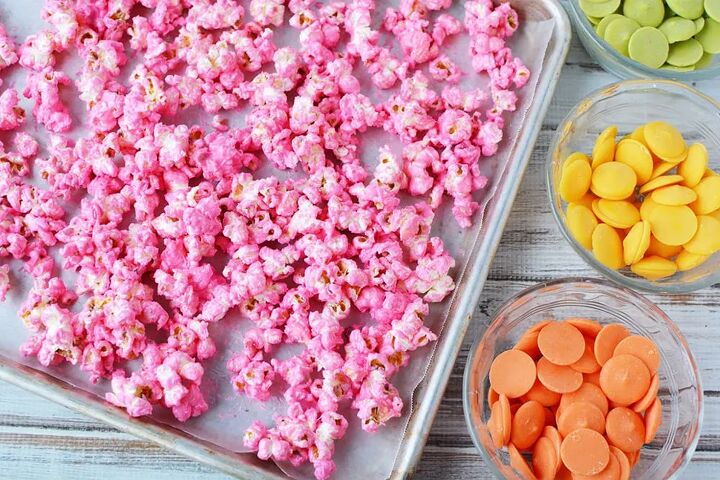 rainbow popcorn snack or party mix, Pink popcorn on a baking sheet