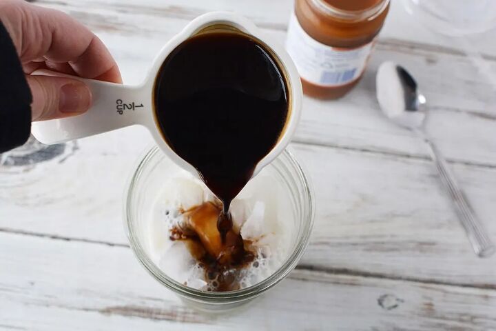 easy homemade iced caramel macchiato recipe, Strong coffee pouring into glass