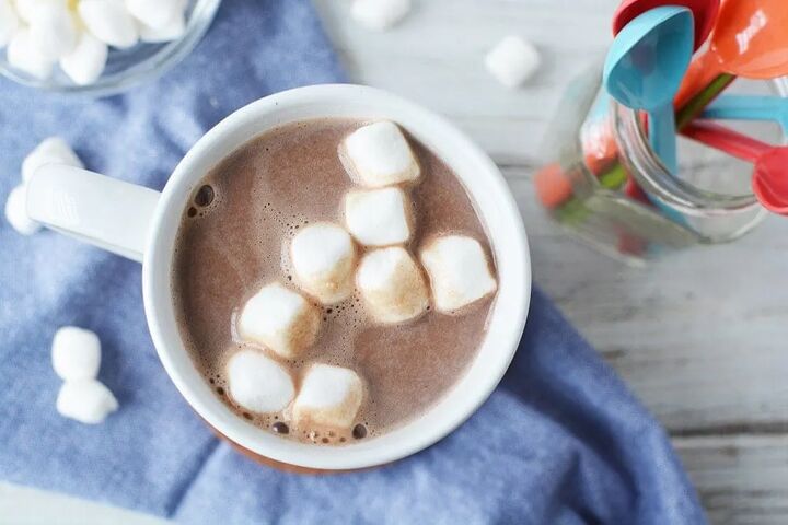 extra creamy homemade hot chocolate recipe, Overhead shot of hot cocoa with marshmallows in a mug