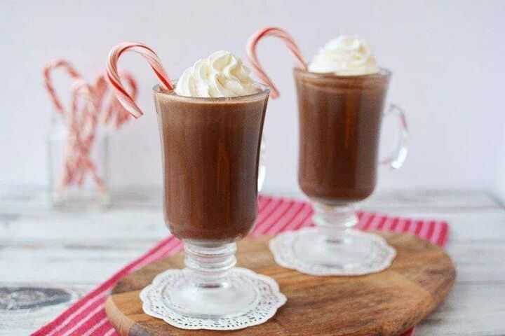 copycat peppermint mocha drink recipe, Mugs filled with coffee drink with whipped cream and candy canes