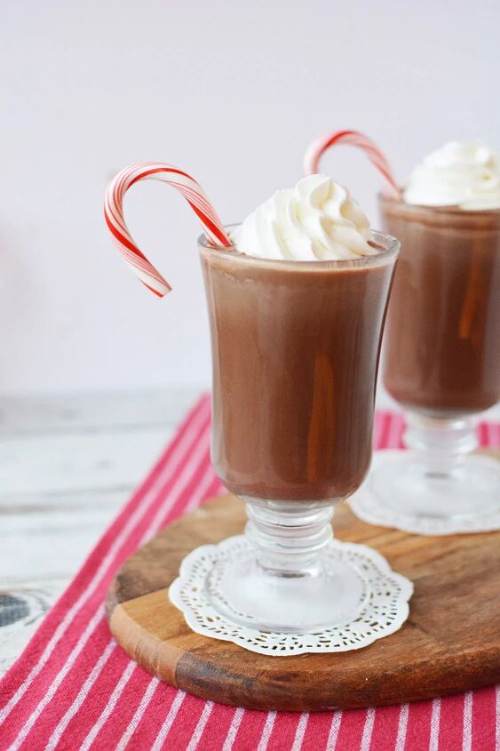 copycat peppermint mocha drink recipe, Mug filled with peppermint mocha whipped cream and candy cane
