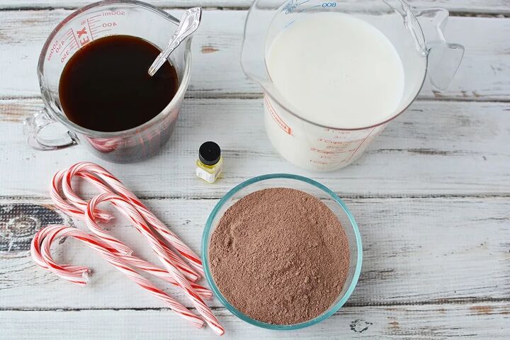 copycat peppermint mocha drink recipe, Coffee candy canes milk and hot cocoa mix on a table