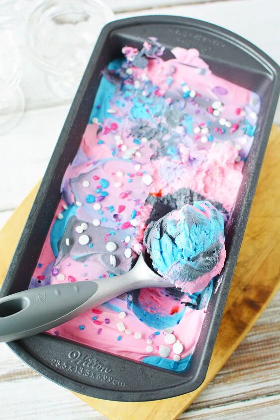 no churn galaxy ice cream recipe, Galaxy ice cream in a pan with a scoop taken out