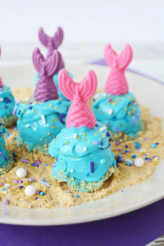 easy mermaid donut holes with fins and sand, Donuts decorated for an under the sea party with mermaid fins