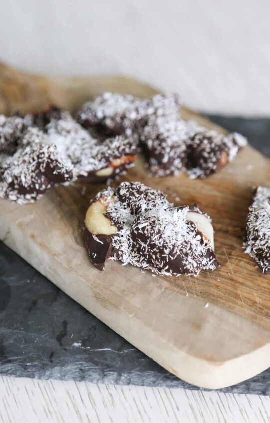 easy dark chocolate brazil nuts, chocolate covered brazil nuts on a cutting board