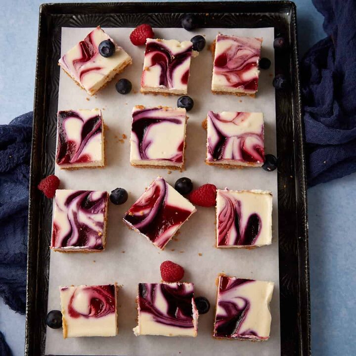 blueberry cream cheese squares, A tray of berry squares on parchment