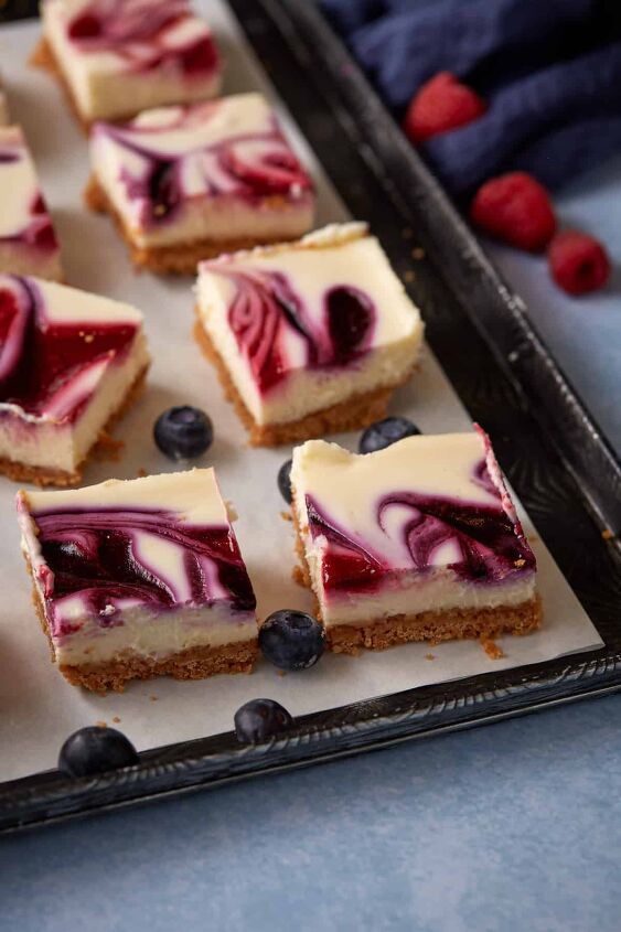 blueberry cream cheese squares, A tray of cheesecake bars