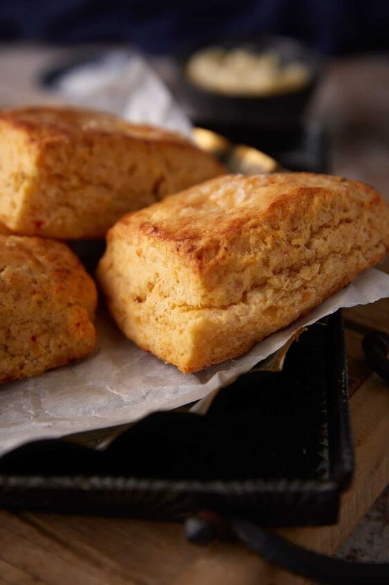fluffy pimento cheese biscuits in 30 minutes, Three pimento cheese biscuits on a cloth napkin